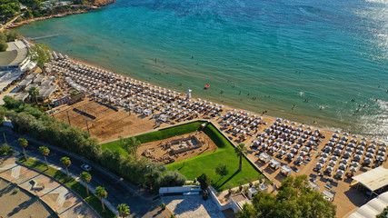 Aerial drone photo of famous paradise celebrity sandy beach of Astir or Asteras in south Athens...
