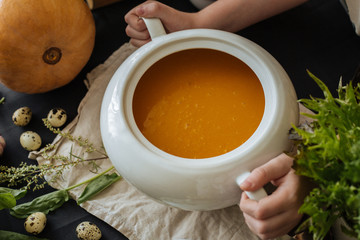 Pumpkin soup in a porcelain tureen