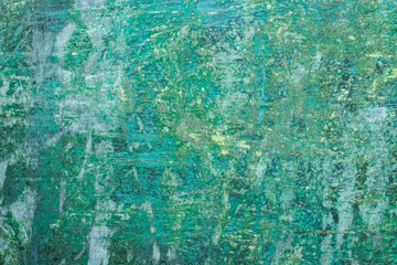 Green grunge painted wall surface worn weathered dirty old rough vintage background surface texture
