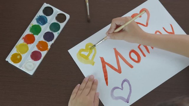 Child paint with watercolors.