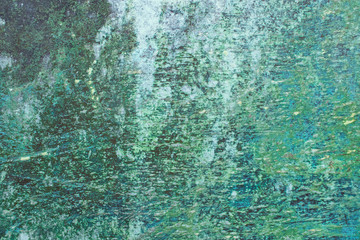 Green grunge painted wall surface worn weathered dirty old rough vintage background surface texture