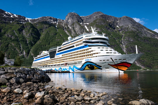 EIDFJORD, NORWAY - June 11, 2017: AIDAsol at Eidfjord Cruise Terminal. AIDAsol is a Sphinx class cruise ship, built at Meyer Werft for AIDA Cruises, one of ten brands owned by Carnival Corp.