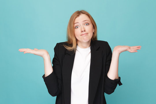 Puzzeled and confused woman isolated