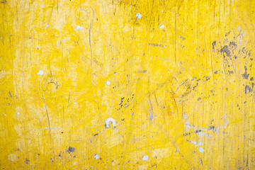 Yellow grunge painted surface worn weathered distressed urban texture background