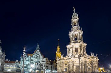 Fototapeta na wymiar Square with Cathedral of the Holy Trinity (Katholische Hofkirche) in Dresden, Germany