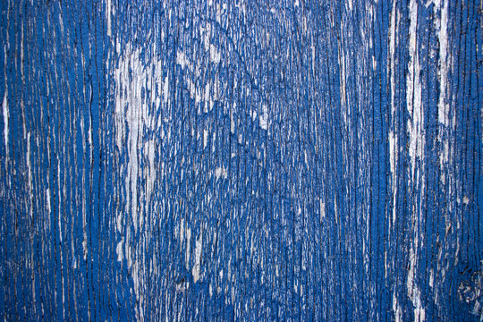 Blue worn painted wood grunge grain distressed old vintage rough background texture © Kyran