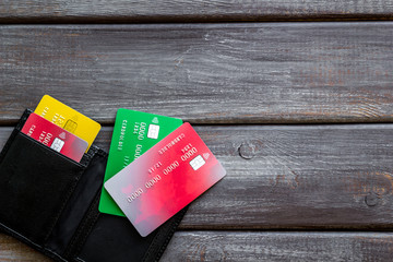 Pay by card concept and wallet on wooden background top view mock-up