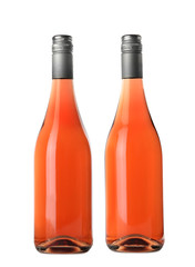 Bottles of delicious rose wine on white background. Mockup for design