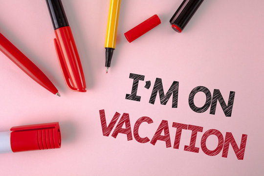Conceptual hand writing showing I Am im On Vacation. Business photo text Break from stressful work pressure travel worldwide written plain Pink background Pens and Marker next to it.