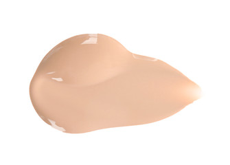 Sample of liquid foundation foundation on white background, top view