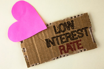 Handwriting text Low Interest Rate. Concept meaning Manage money wisely pay lesser rates save...