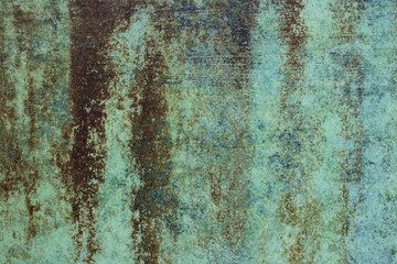 Green grunge painted wall surface worn weathered dirty old rough vintage background surface texture