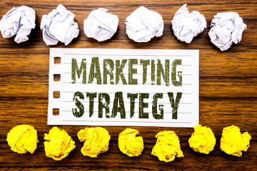 Handwritten text showing Marketing Strategy. Business concept for Success Digital Plan Written on...