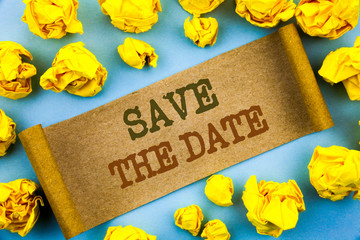 Naklejka premium Word, writing, text Save The Date. Business concept for Wedding Anniversary Invitation Reminder written tear paper with folded paper the background.