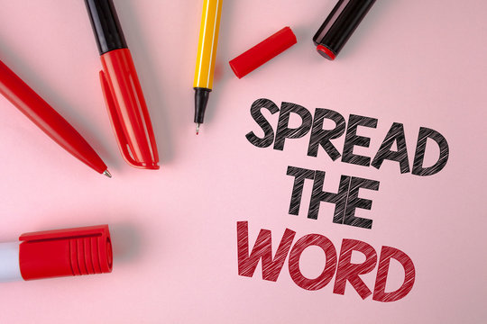 Conceptual hand writing showing Spread The Word. Business photo text Run advertisements to increase store sales many fold written plain Pink background Pens and Marker next to it.