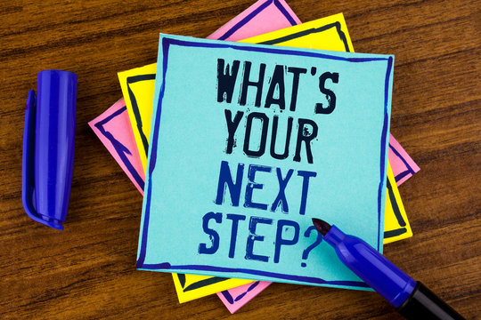 Handwriting text writing What iS Your Next Step Question. Concept meaning Analyse ask yourself before taking decisions written Sticky note paper wooden background Marker next to it.