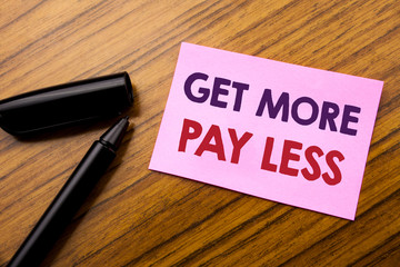 Word, writing Get More Pay Less. Business concept for Budget Slogan Concept Written on sticky note red paper, wooden background pen. Note stick on the desk.