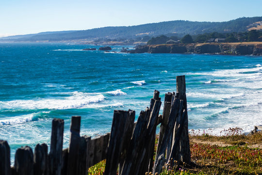 An Old Fence Blocks A Cliff Edge Along The Northern California Coast