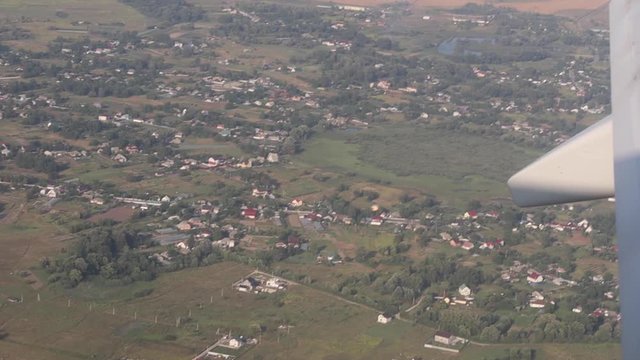 View of Imphal and surrounding area in slow motion from plane window just before landing
