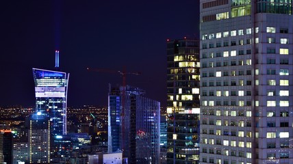 Fototapeta na wymiar Modern office building at night. Night lights, city office building downtown, cityscape view 