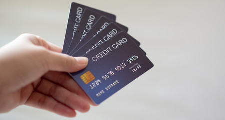 Close-up credit card, isolated on a white background, concept of submission, concept of banner, online media.