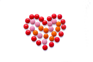  heart shape made of sweets of different colors