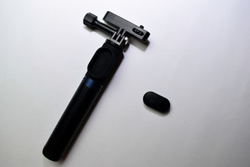 Close up Black selfie stick isolated on a white background