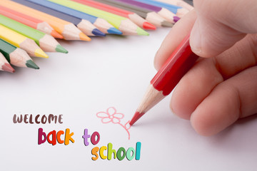 Hand drawing near pencils