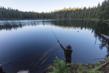 Male fishing in the lake