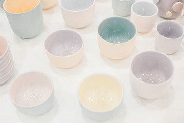 Fototapeta na wymiar Top view. Set of multicoloured ceramic minimalistic vase.