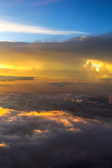 Spectacular sky with golden clouds and bright sunlight