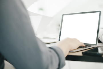 Mockup image of engineers using laptop to drawing design building Project in office, mockup concept