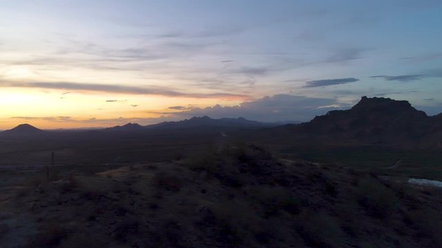 Glorious Western Sunset in Arizona Sonoran Desert with Red Mountain