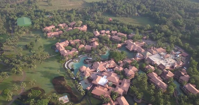 Drone shot flying over beautiful architectural buildings