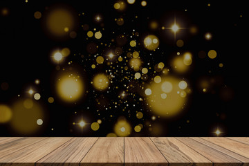Wood table top on golden bokeh background. For montage product display or mock up for space