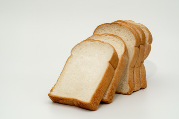 Sliced bread on white background