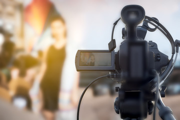 Video camera on abstract background - concept for business
