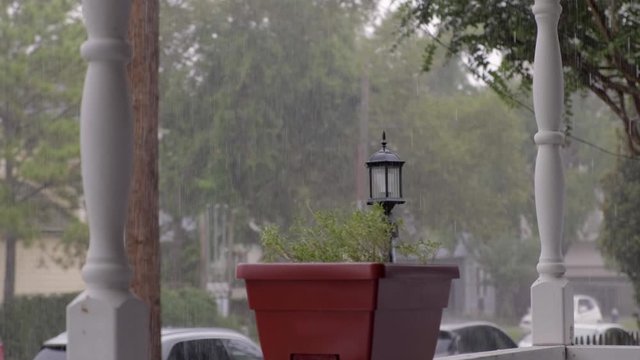 Rain falling in residential neighborhood