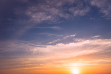 Naklejka na ściany i meble Dawn sun in the blurry clouds in the early morning.