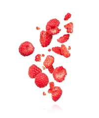 Poster Whole and sliced raspberries in the air, isolated on a white background © Krafla