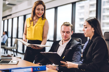 Successful group of casual business discussing and working with laptop computer.creative business people planning and brainstorm in modern office.Teamwork concept