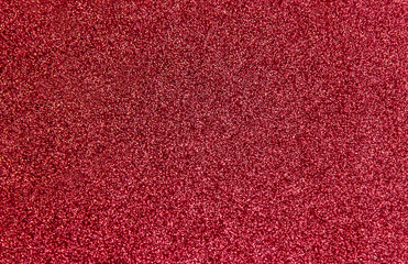 Spotted fabric with glitter as background.