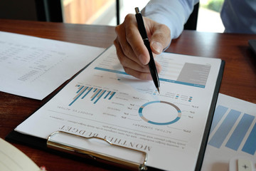 Businessmen, financial accountants, planners, work, planning, ideas in the office, using the tools and calculators to work