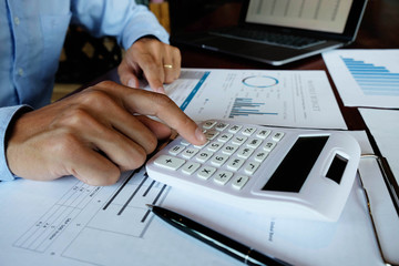 Businessmen, financial accountants, planners, work, planning, ideas in the office, using the tools and calculators to work