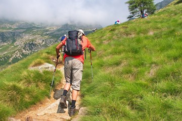 Rear view of senior man hiking in Brenta Dolomites, Italy