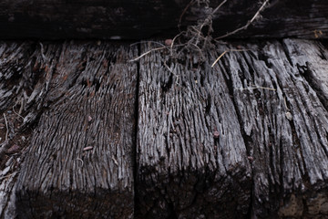 black dark old crack wood log railway sleepers weathered dim light tone high detail nature texture