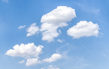 Naklejka na ściany i meble White clouds against blue sky as background