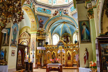 Fototapeta na wymiar Interior of Trinity Church at Market Square in Berezhany, Ternopil region, Ukraine. August 2019