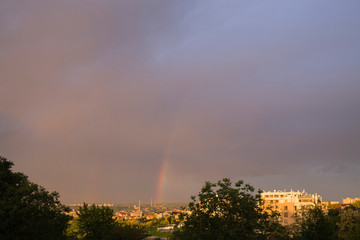 Rainbow and city.