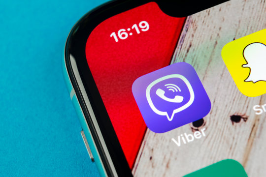 Sankt-Petersburg, Russia, September 19, 2018: Viber application icon on Apple iPhone X smartphone screen close-up. Viber app icon. Social media icon. Social network